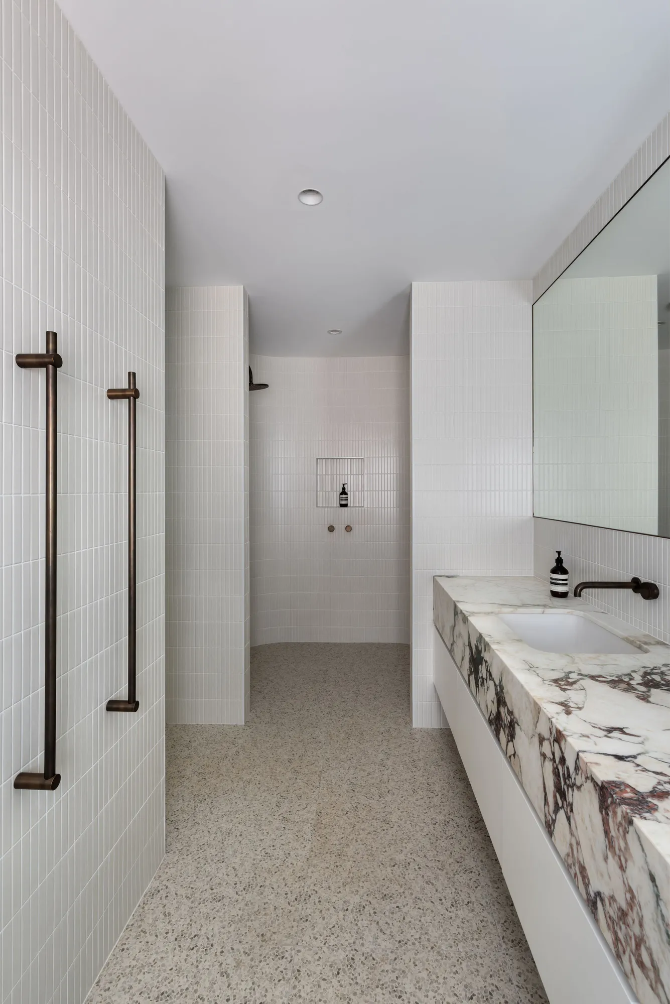 Bathroom renovation with marble vanity and walk-in shower designed by Collected Interiors Perth